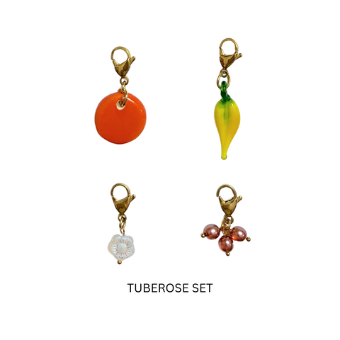 Charm Sets of (4)