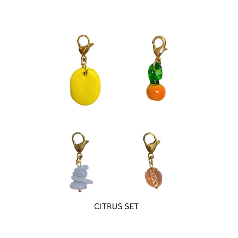 Charm Sets of (4)